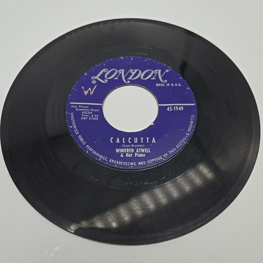 Calcutta / Melody In G Winifred Atwell and Her Piano 45 RPM Vinyl Record